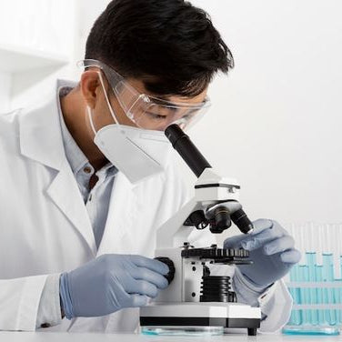 a man studying spores